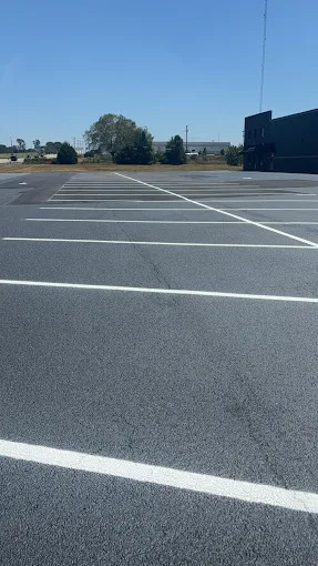 Parking lot line striping